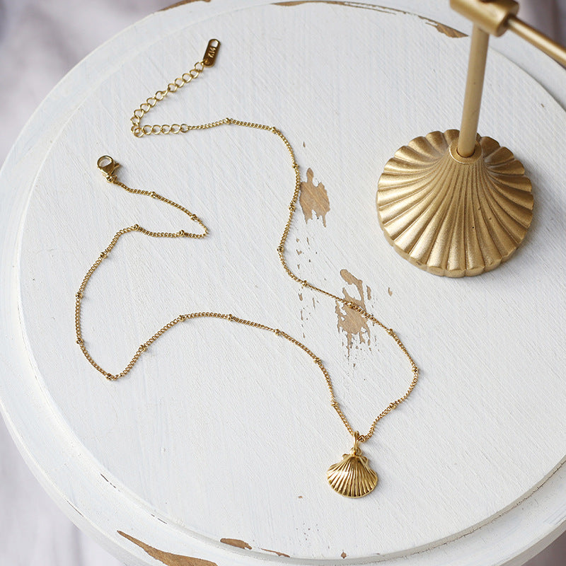 Golden Clamshell Pendant Necklace