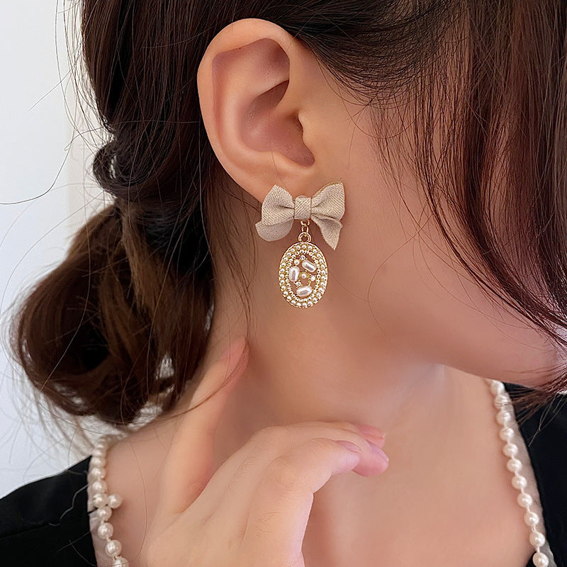 Elegant Bow Pearl Dangle Earrings