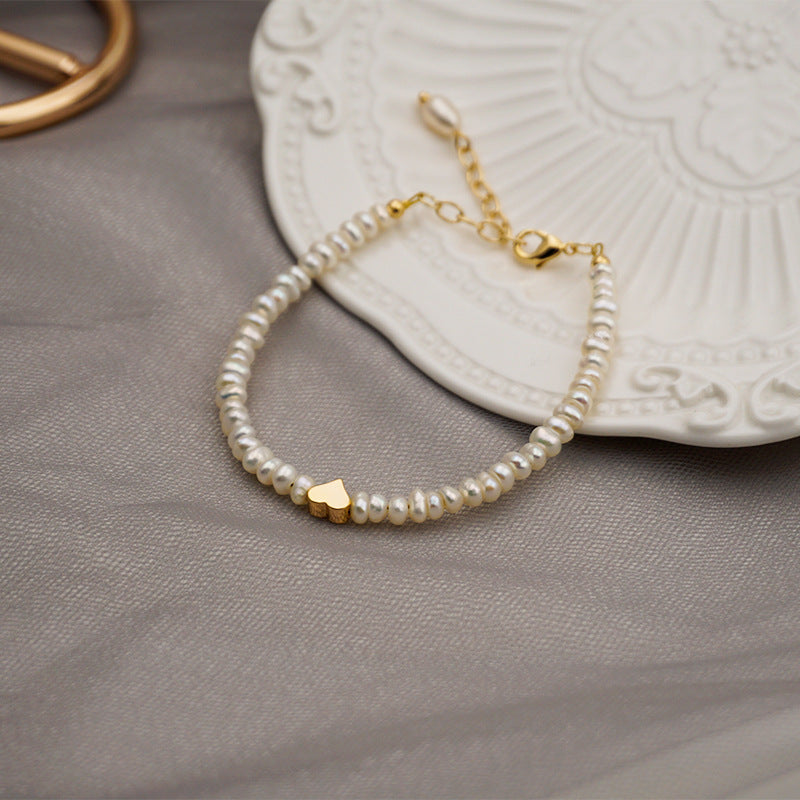 Adjustable Pearl Bracelet with Charm