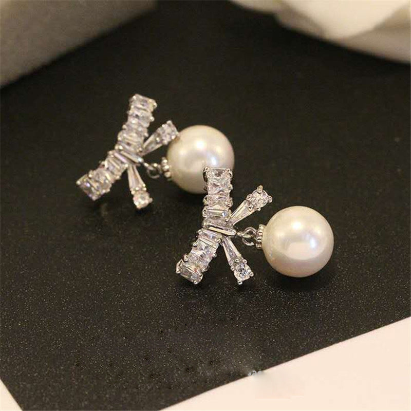 Diamond Bow Pearl Dangle Earrings