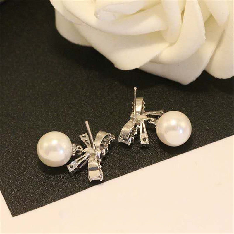 Diamond Bow Pearl Dangle Earrings