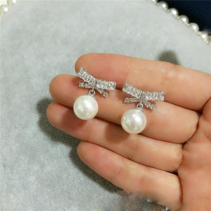 Diamond Bow Pearl Dangle Earrings