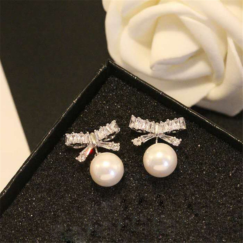 Diamond Bow Pearl Dangle Earrings